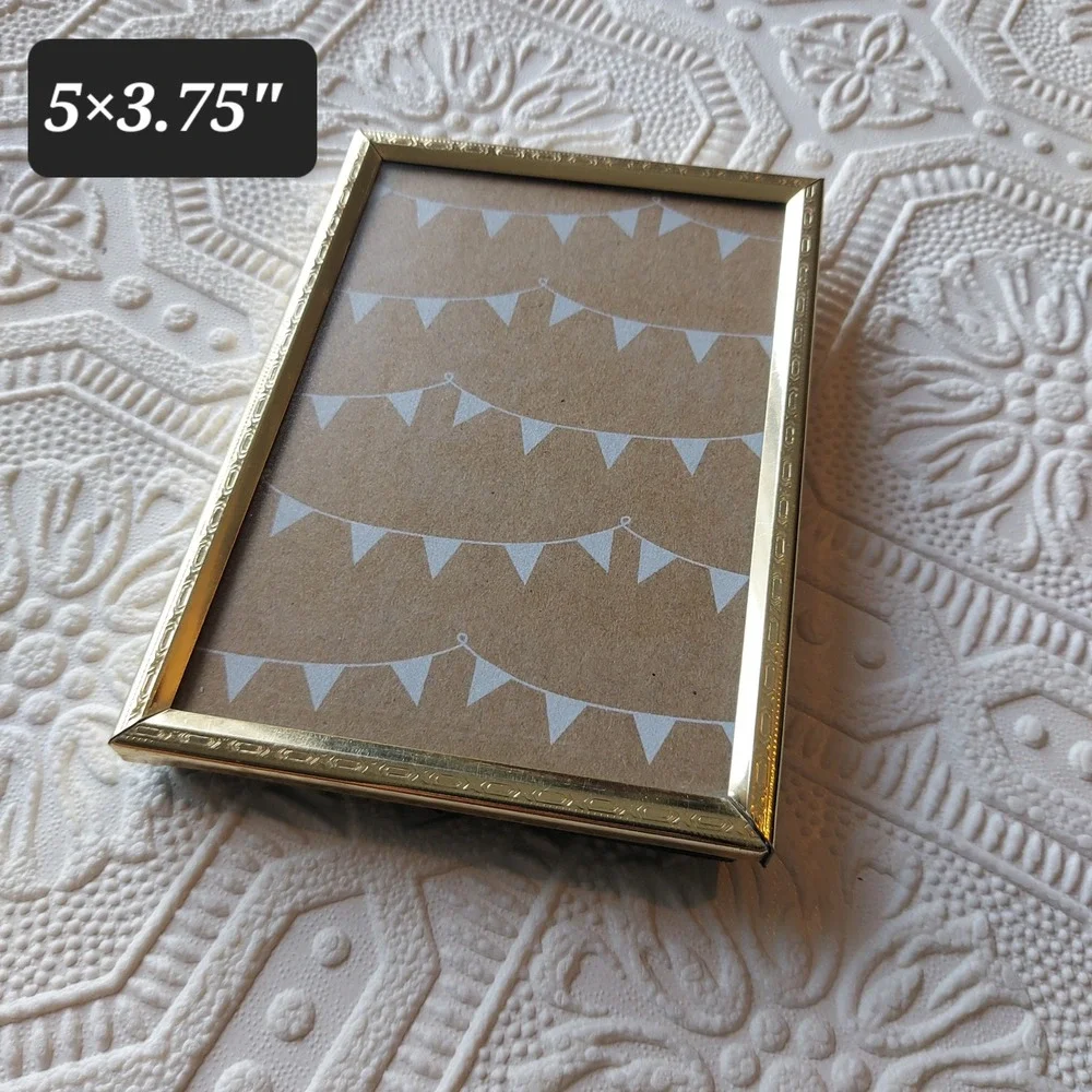 Decorel Gold Tone Metal 5x3.75 Ornate Embossed Tabletop Wall Picture Frame